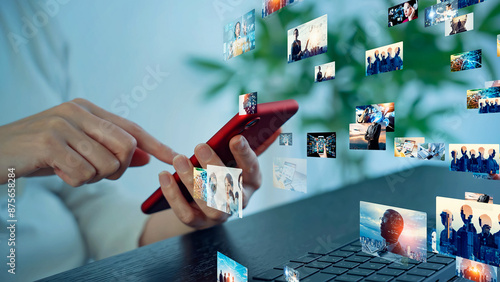 Canvas Print A woman using computer and smart phone in office and digital contents concept