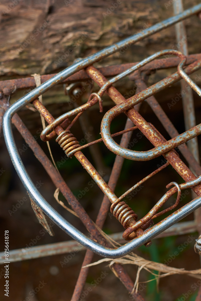 discarded rusty bicycle luggage carrier or storage rack left outdoor close-up, selective focus with copy space discarded rusty bicycle luggage carrier or storage rack left outdoor close-up, selective focus with copy space