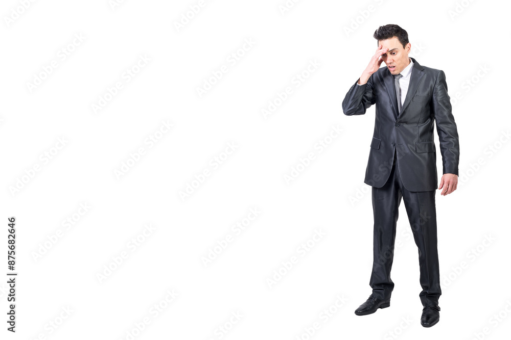 Concerned businessman making mistake and touching forehead Concerned businessman making mistake and touching forehead