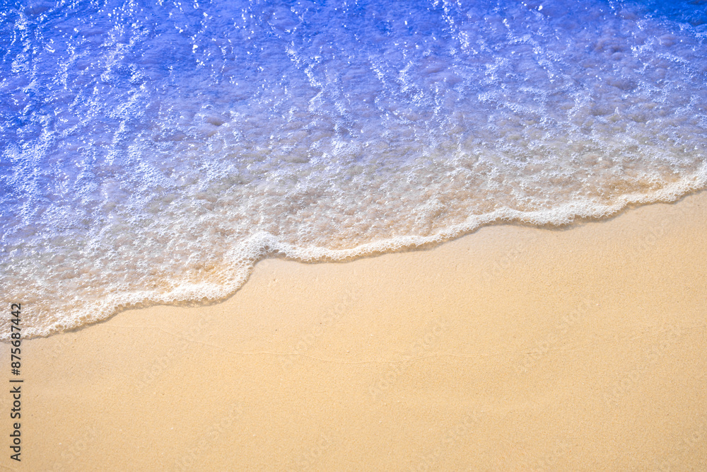 Top view of background for summer vacation concept. Nature of the beach and sea, summer with sunlight, sandy beach The sparkling sea water Top view of background for summer vacation concept. Nature of the beach and sea, summer with sunlight, sandy beach The sparkling sea water