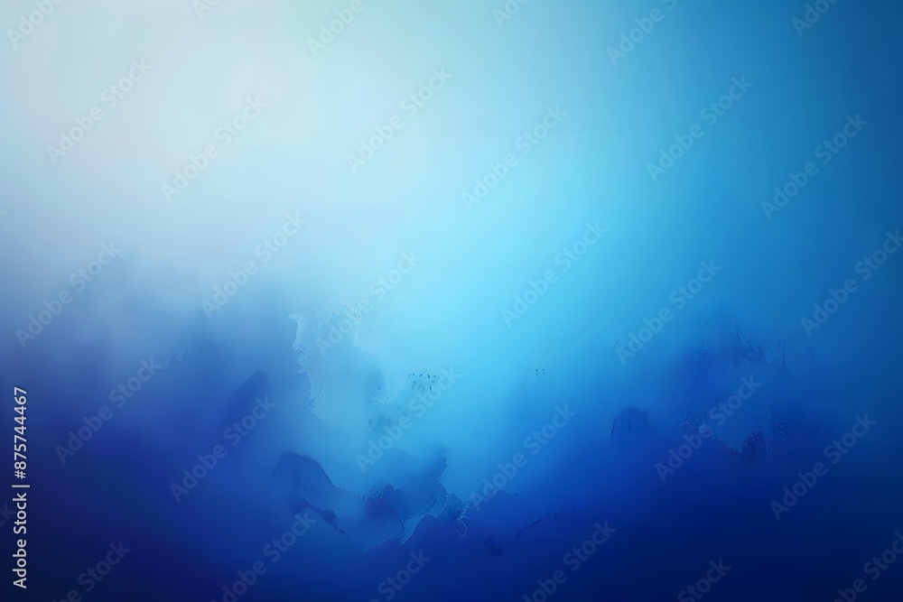 Fototapeta premium Abstract blue gradient background with soft misty texture, evoking tranquility and depth.
