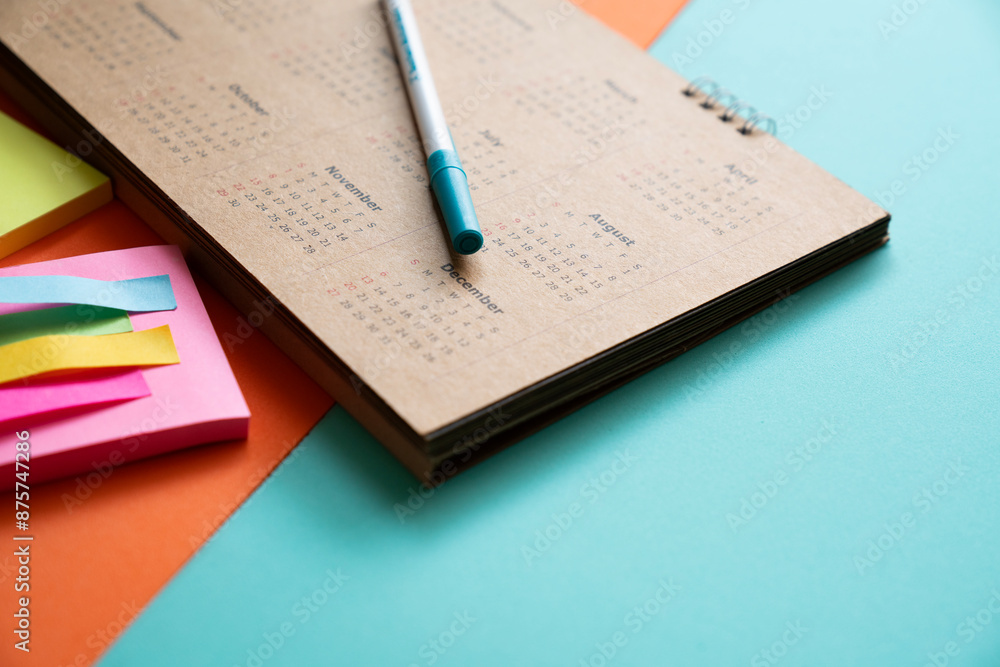 close up of calendar on the green table background, planning for business meeting or travel planning concept close up of calendar on the green table background, planning for business meeting or travel planning concept