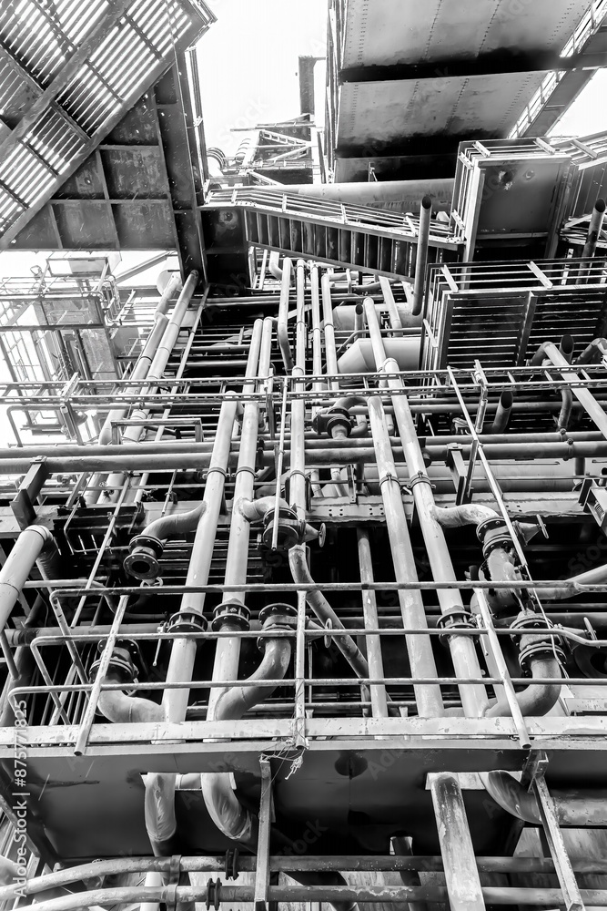 many pipe connections on a disused blast furnace