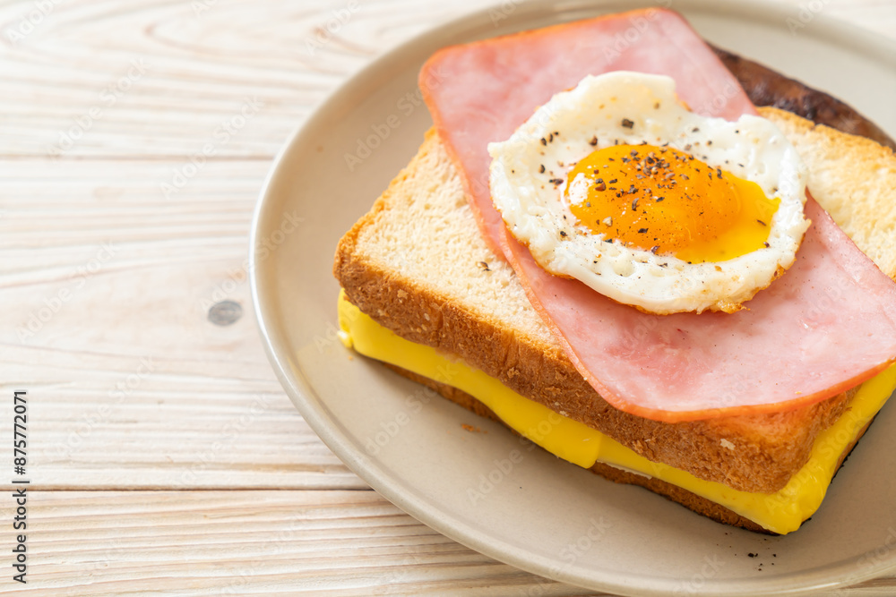 bread toasted cheese topped ham and fried egg with pork sausage bread toasted cheese topped ham and fried egg with pork sausage