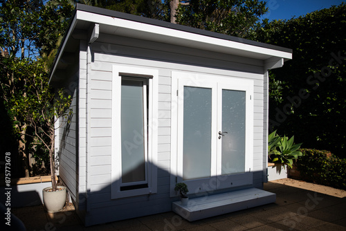 Modern hampton white grey backyard storage garden shed organise clever tidy tiny house shadow