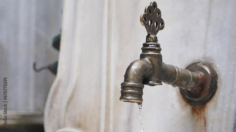 water pouring from a faucet tap outdoor in istanbul water pouring from a faucet tap outdoor in istanbul