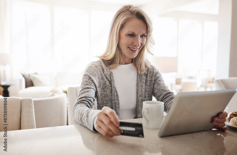 Senior woman, tablet and credit card for bills in home, banking website and online payment. Female person, transaction and customer purchase on app, ecommerce and checkout for discount or order Senior woman, tablet and credit card for bills in home, banking website and online payment. Female person, transaction and customer purchase on app, ecommerce and checkout for discount or order