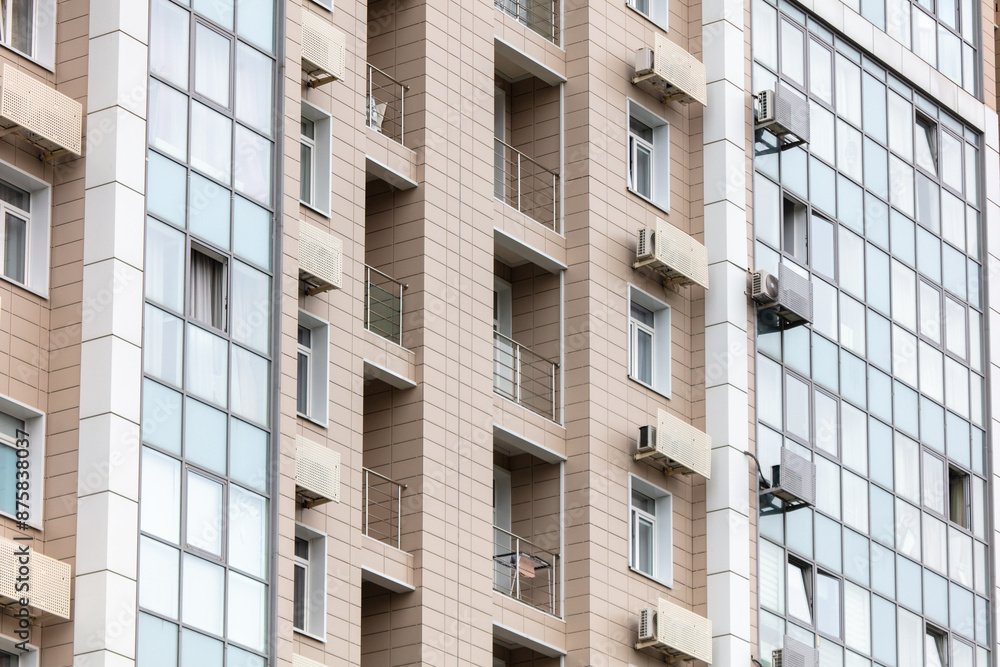 Glass walls of an air-conditioned building as a background Glass walls of an air-conditioned building as a background