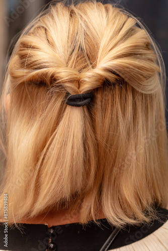 Braids on a woman's head. Close-up