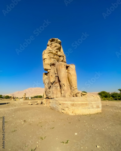 Colossi of Memnon, two massive stone statues representing the pharaoh, Luxor, Egypt photo