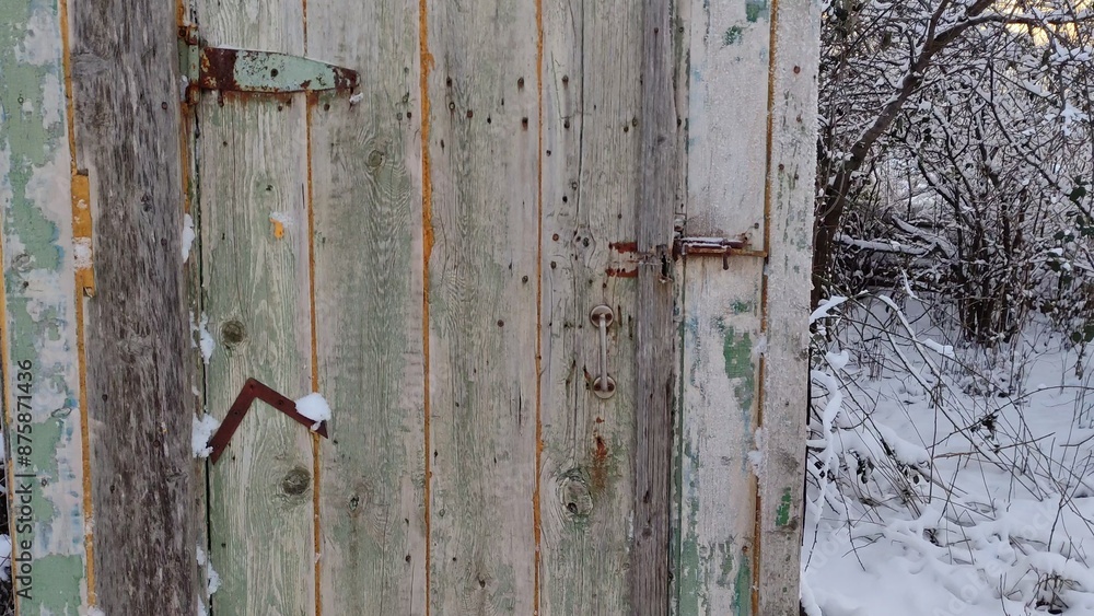 Man opens the door to an old village toilet in winter and shows the toilet hole First person view video Man opens the door to an old village toilet in winter and shows the toilet hole First person view video