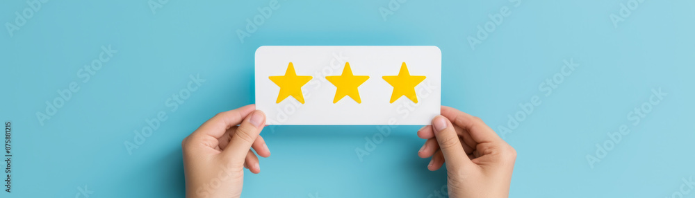 Customer displaying a five-star rating card for satisfaction guarantee Customer displaying a five-star rating card for satisfaction guarantee