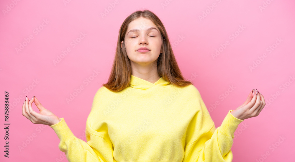 Teenager Russian girl isolated on pink background in zen pose Teenager Russian girl isolated on pink background in zen pose