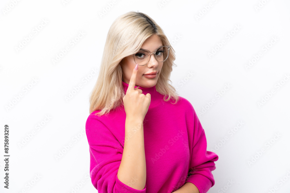 Young Russian woman isolated on white background showing something Young Russian woman isolated on white background showing something