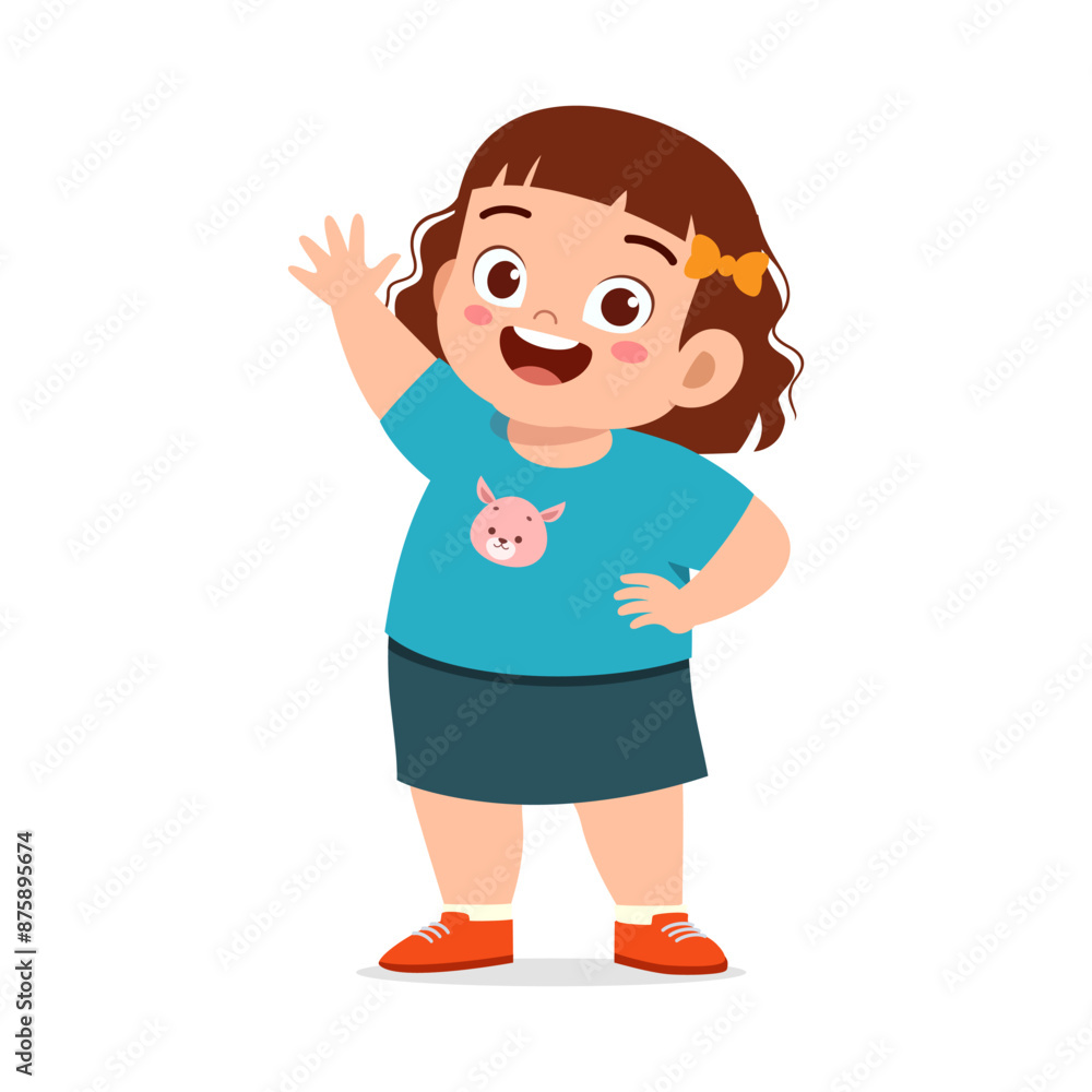 little fat kid standing and waving hand and feeling happy little fat kid standing and waving hand and feeling happy