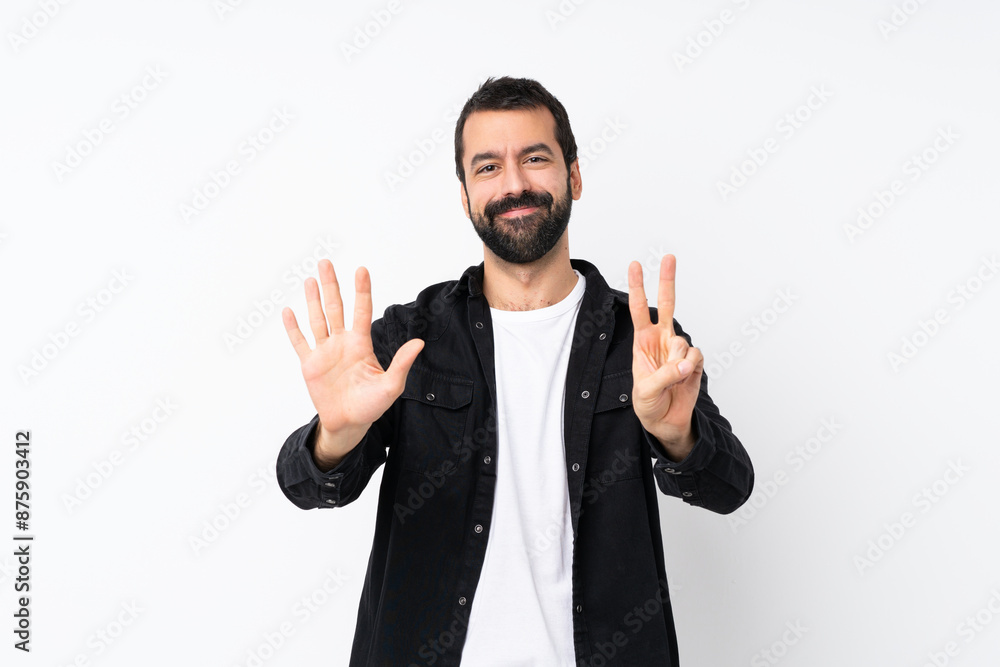 Young man with beard over isolated white background counting seven with fingers Young man with beard over isolated white background counting seven with fingers