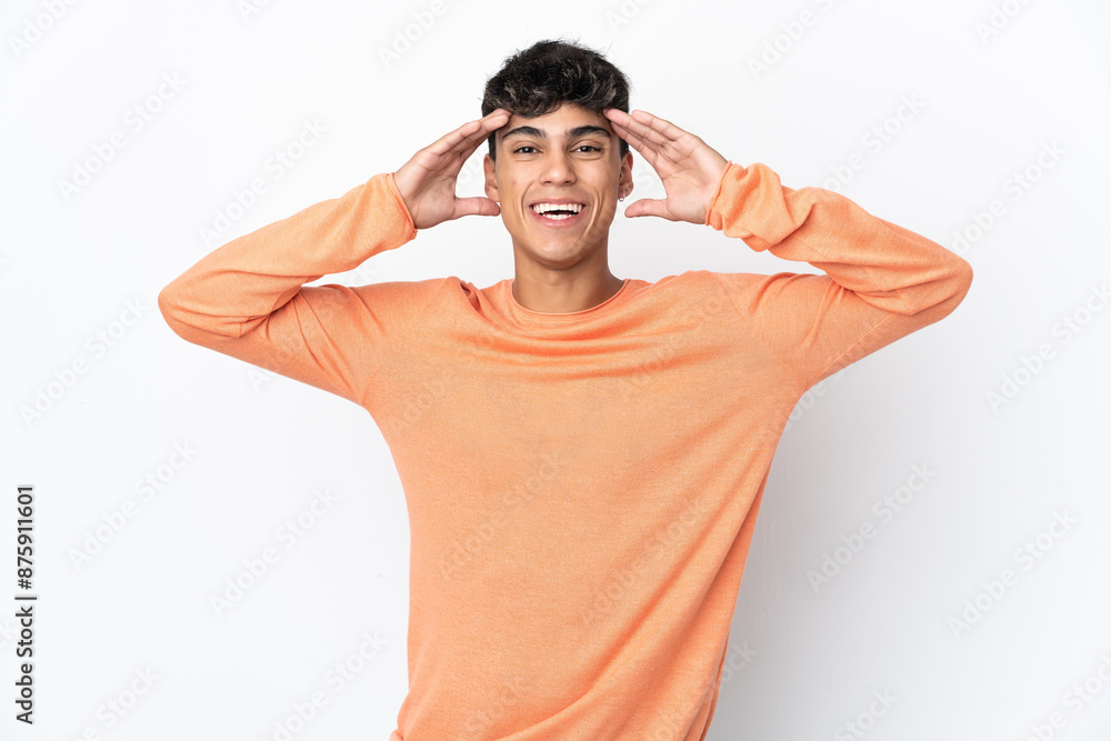 Young man over isolated white background with surprise expression Young man over isolated white background with surprise expression