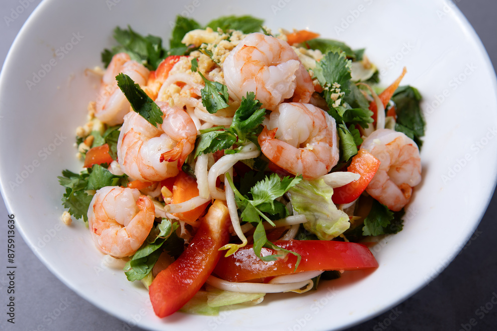 Asian shrimp salad with fresh vegetables on plate Asian shrimp salad with fresh vegetables on plate