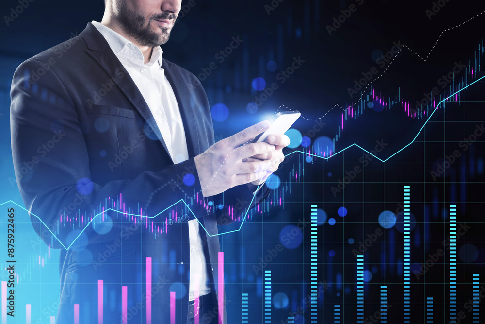 Man using smartphone with overlay of stock market graphs, digital style on a dark blue background, concept of finance analysis Man using smartphone with overlay of stock market graphs, digital style on a dark blue background, concept of finance analysis