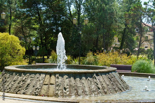 Gorgeous set of fountains next to the Festivalny concert hall. Fountains in a landscaped city park along Kurortny Prospekt in Sochi. photo