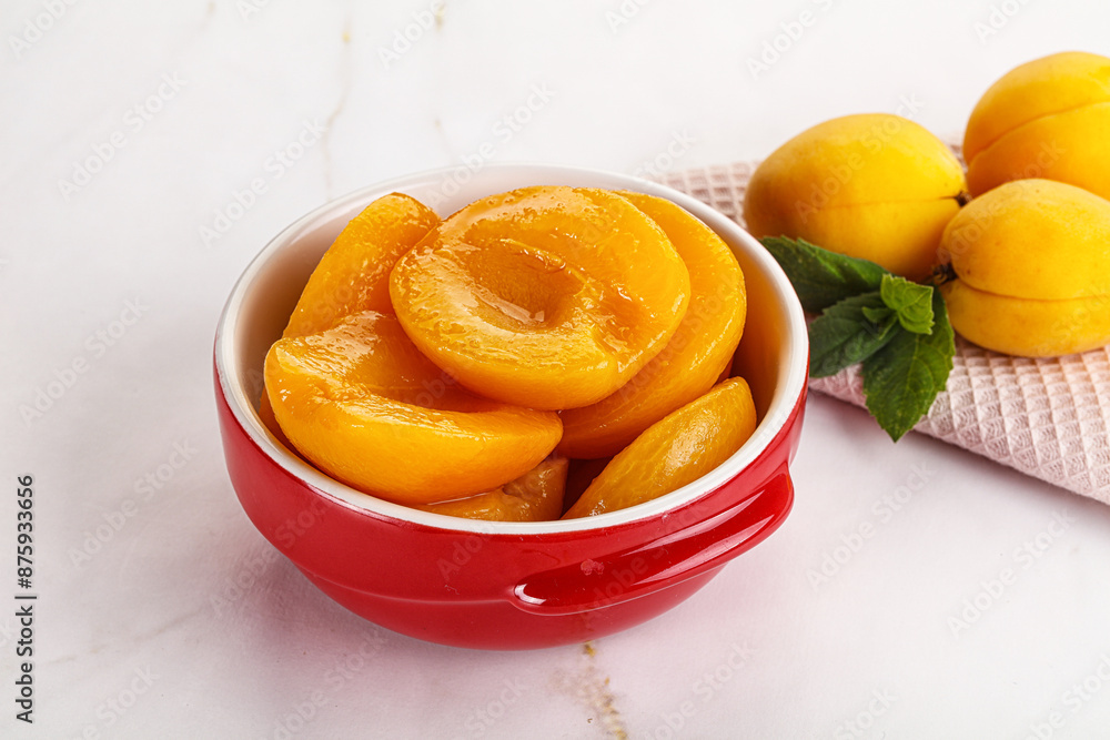 Few canned aprocots in the bowl Few canned aprocots in the bowl