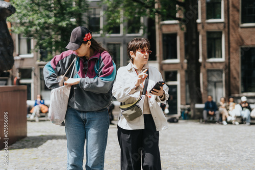 Photography Two women visiting Amsterdam, exploring the city streets on a sunny afternoon