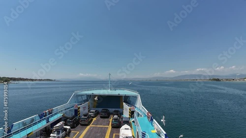 Hyper lapse of  passenger ferry boat cruising in the open sea. Time lapse of tourist transport boat from Keramoti to Thassos, Greece. photo