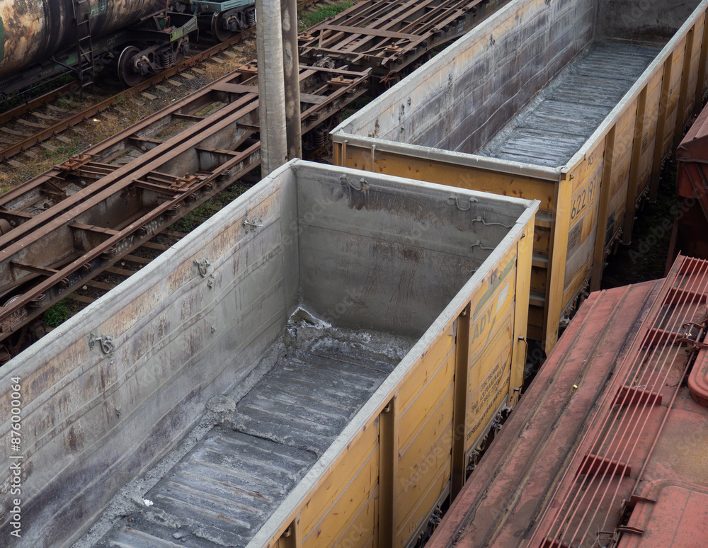 Empty freight cars on the rails. Cargo depot. View from above. Dry cargo wagons. Empty freight cars on the rails. Cargo depot. View from above. Dry cargo wagons.