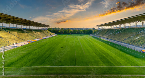 overhead of the green grass of a soccer field or golf course for background or texture.Green. Generative AI.