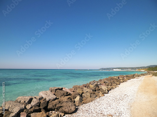 Breakwater on beach in Vada, Italy.