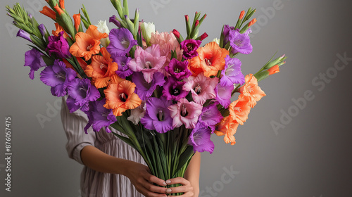 Wallpaper Mural One hand holding a large bouquet of purple and orange pionies made by a florist. modern long shape, modern look. coffeeshop Torontodigital.ca
