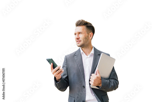 A businessman man in a suit uses a phone and writes a message. cut out background