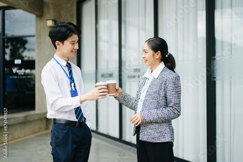  Businessman and woman going in city center in smart casual business style, talking, working together, stylish freelance people photo