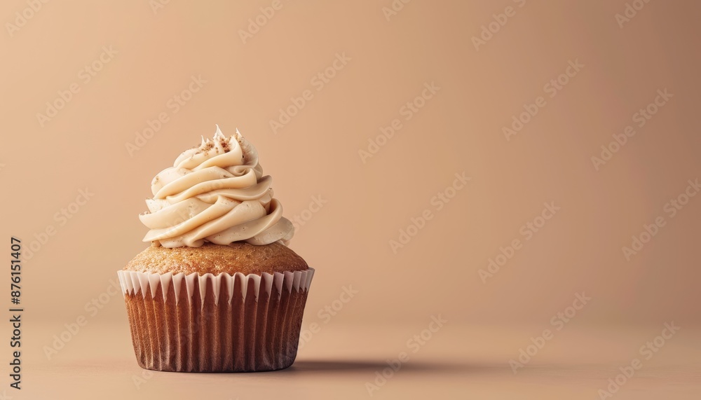 Peanut Butter Cupcake on Brown Background, Sweet Treat, Copy Space Peanut Butter Cupcake on Brown Background, Sweet Treat, Copy Space