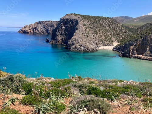 Cala Domestica and caleta, view from Hiking trail. Famous beach in South Sardinia , Italy