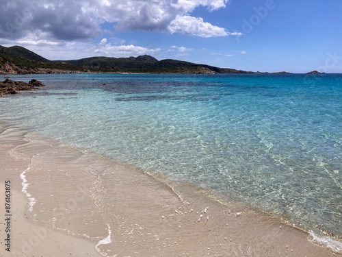 View of the glass like, clear water of Turreda beach in South Sardinia