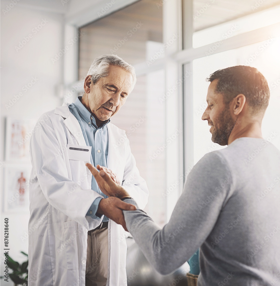 Fototapeta premium Man, patient and doctor for hand inspection of wrist checkup, arthritis and exam for diagnosis assessment. Medical, people and joint pain from accident, nerve problem and healing arm for wellness