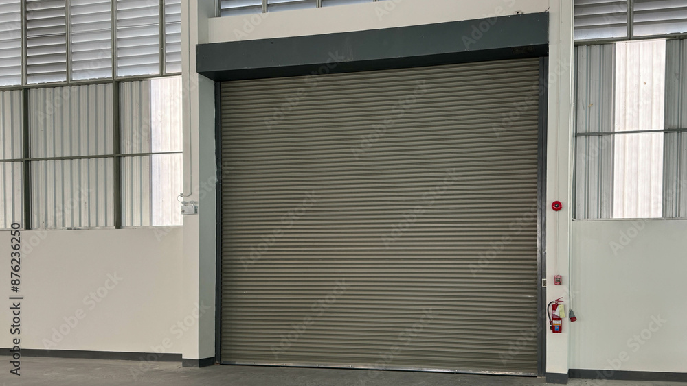 a steel roller shutter door. Industrial door. a steel roller shutter door. Industrial door.