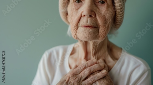 The elderly woman with hat photo