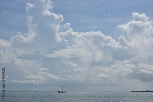 caribbean sea under the blue sky with developping clouds photo