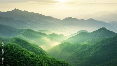 Majestic green mountains with misty peaks at dawn, ideal for travel and nature  