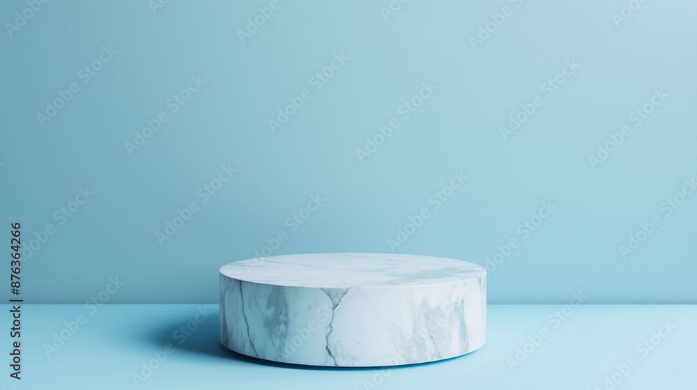A marble sculpture sits on a blue background. Product presentation background A marble sculpture sits on a blue background. Product presentation background