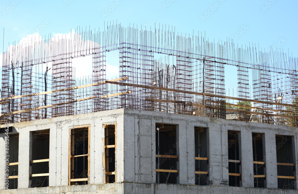 The upper floor of a modern apartment building under construction The upper floor of a modern apartment building under construction