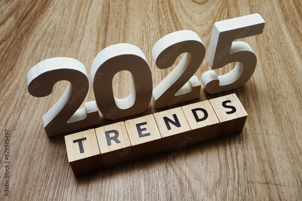 Trends 2025 word alphabet letters on wooden background Trends 2025 word alphabet letters on wooden background