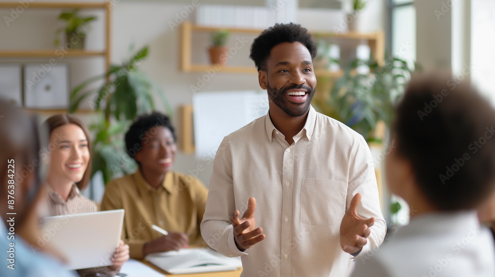 Obraz premium A confident businessman leader meeting and discussion with smiling and standing with professional team in an office, symbolizing success and teamwork.