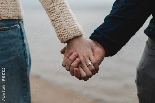 Engaged Couple Holding Hand Proposal photo