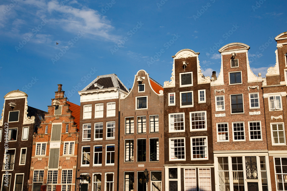 Panoramic view of Amsterdam canals and typical dutch houses Panoramic view of Amsterdam canals and typical dutch houses