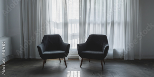Two armchairs facing each other dark cozy atmosphere