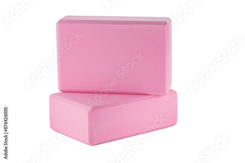 Pink polypropylene yoga block isolated on white background. Sports and health products.