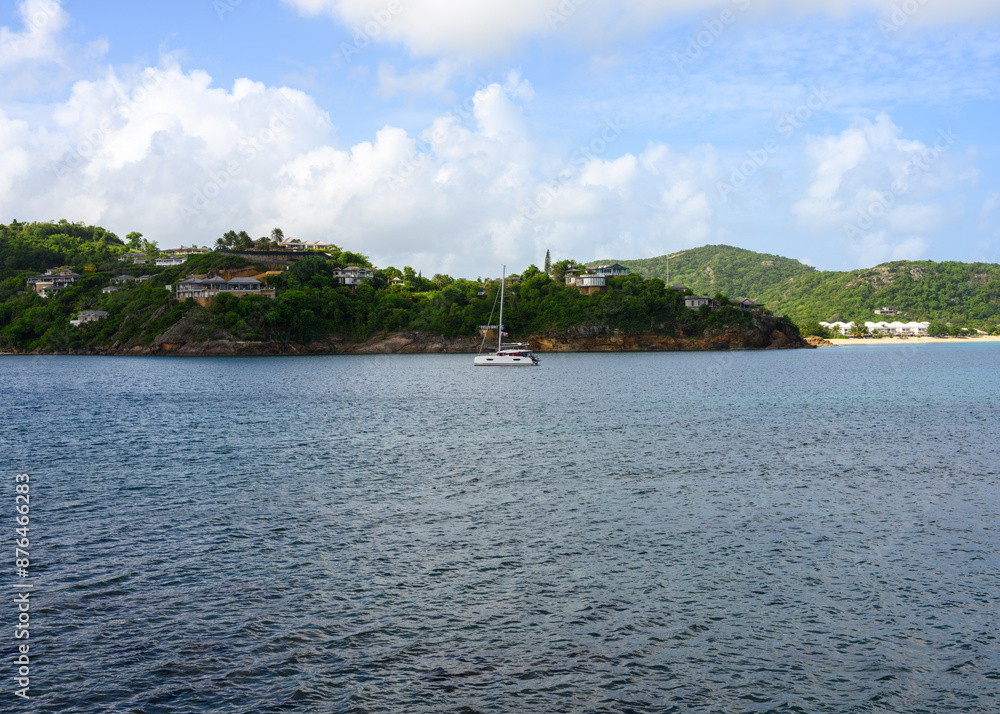 Boats in a tropical bay on the island of Antigua. Boats in a tropical bay on the island of Antigua.